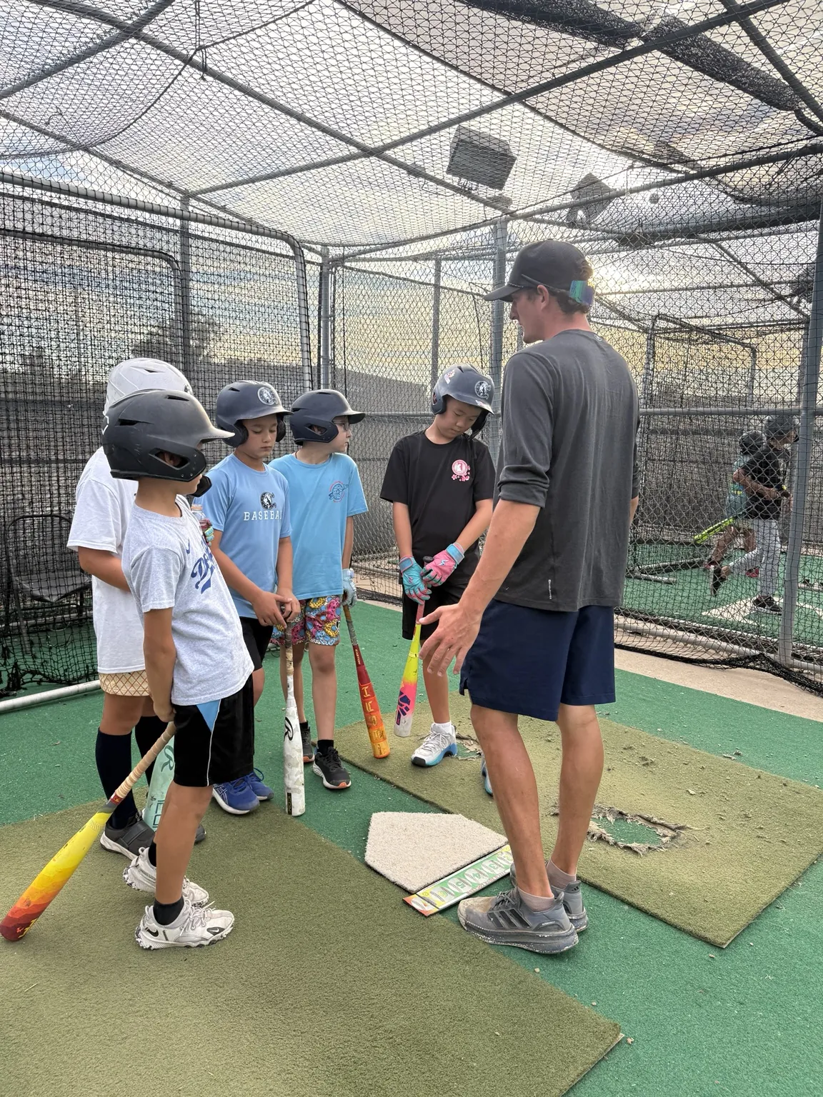 Game Ready coach working with players at camp