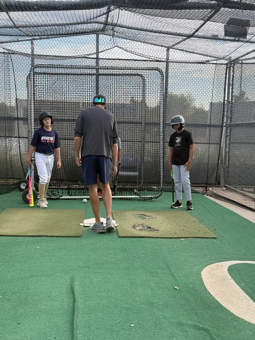 Coach David working with players at Game Ready Baseball