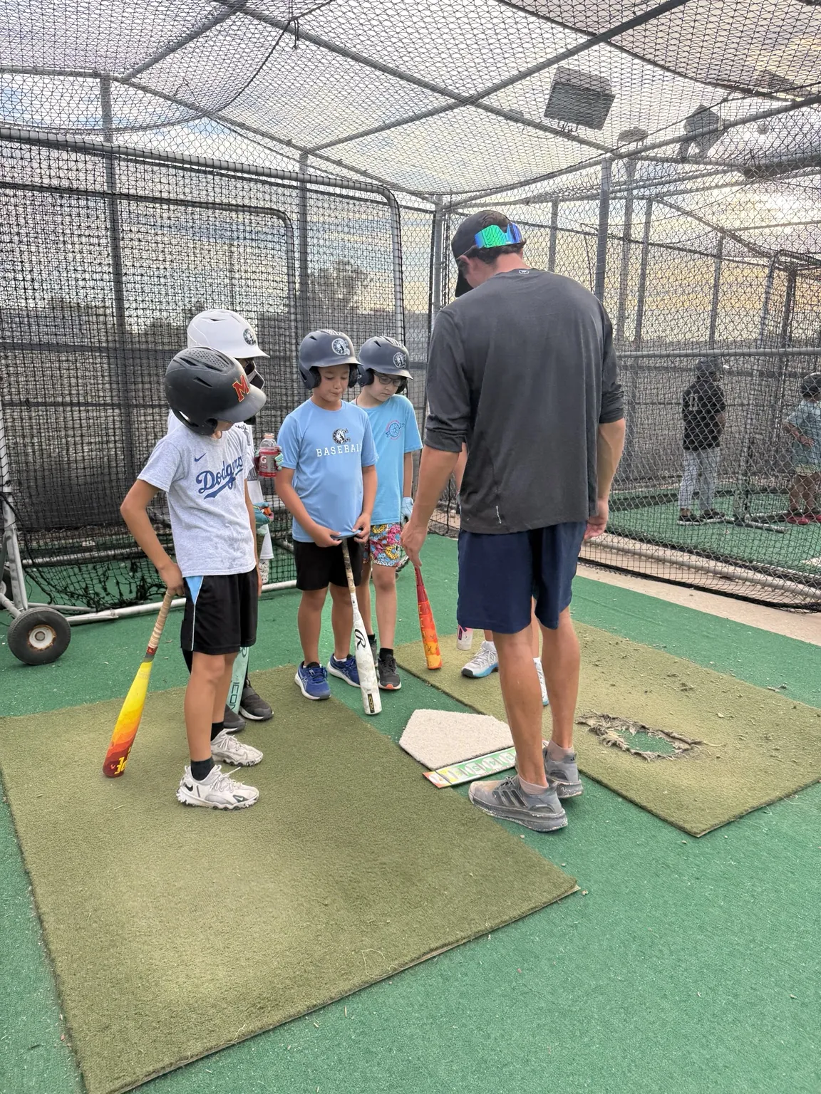 Game Ready coach working with players at camp